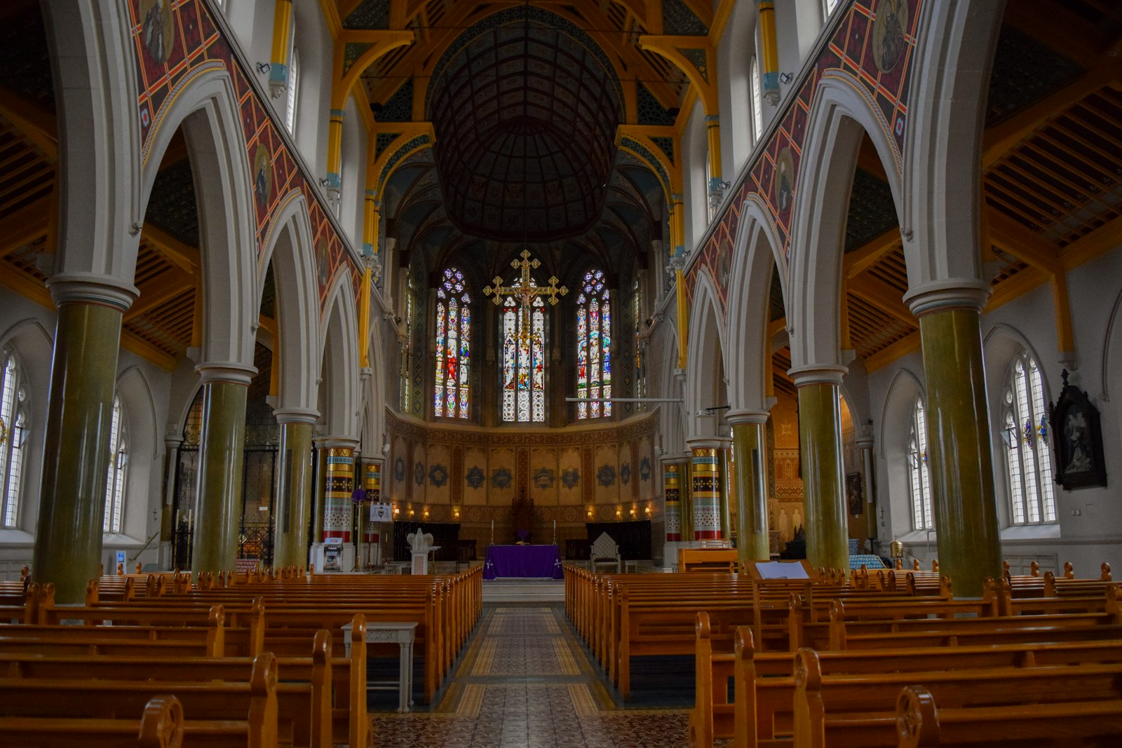 Adonai lyrics - interior of a church with wooden pews