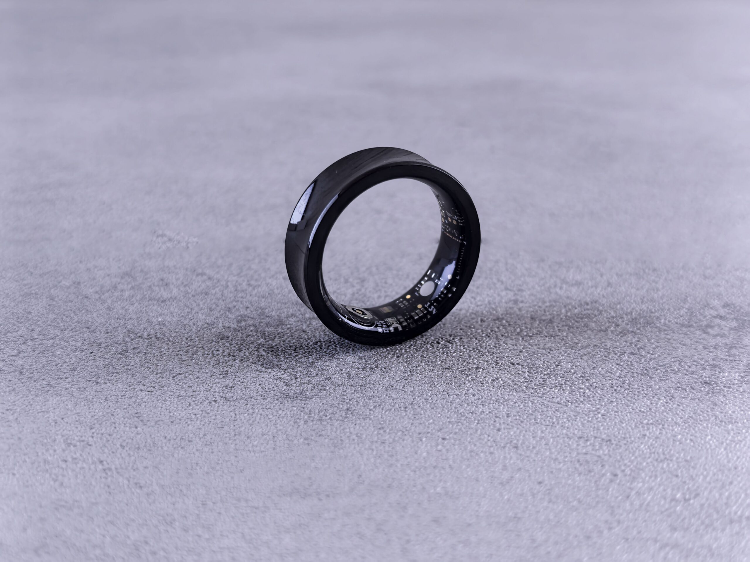 Wearable technology: black smart ring with visible circuitry