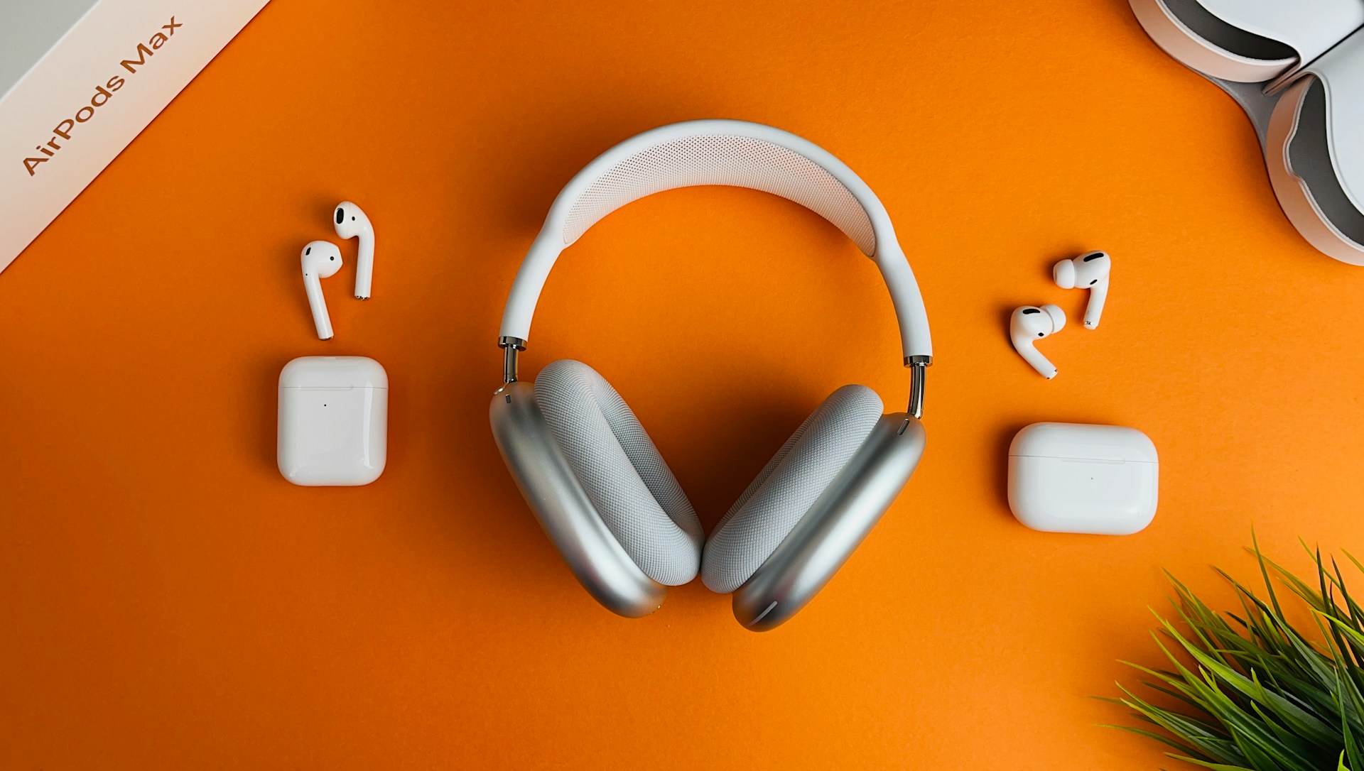 Wireless headphones on orange background among the latest tech gadgets 2025