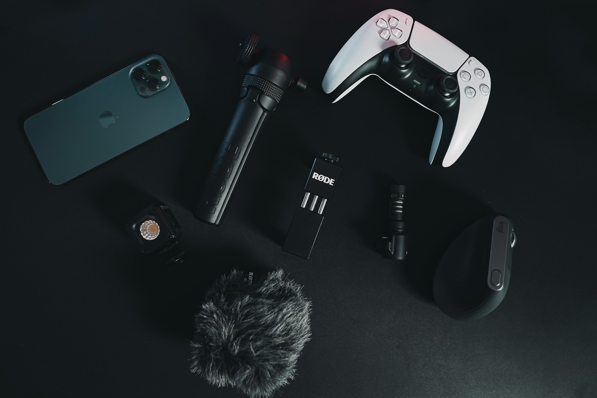 Gaming controller, smartphone and microphone from the latest tech gadgets 2025