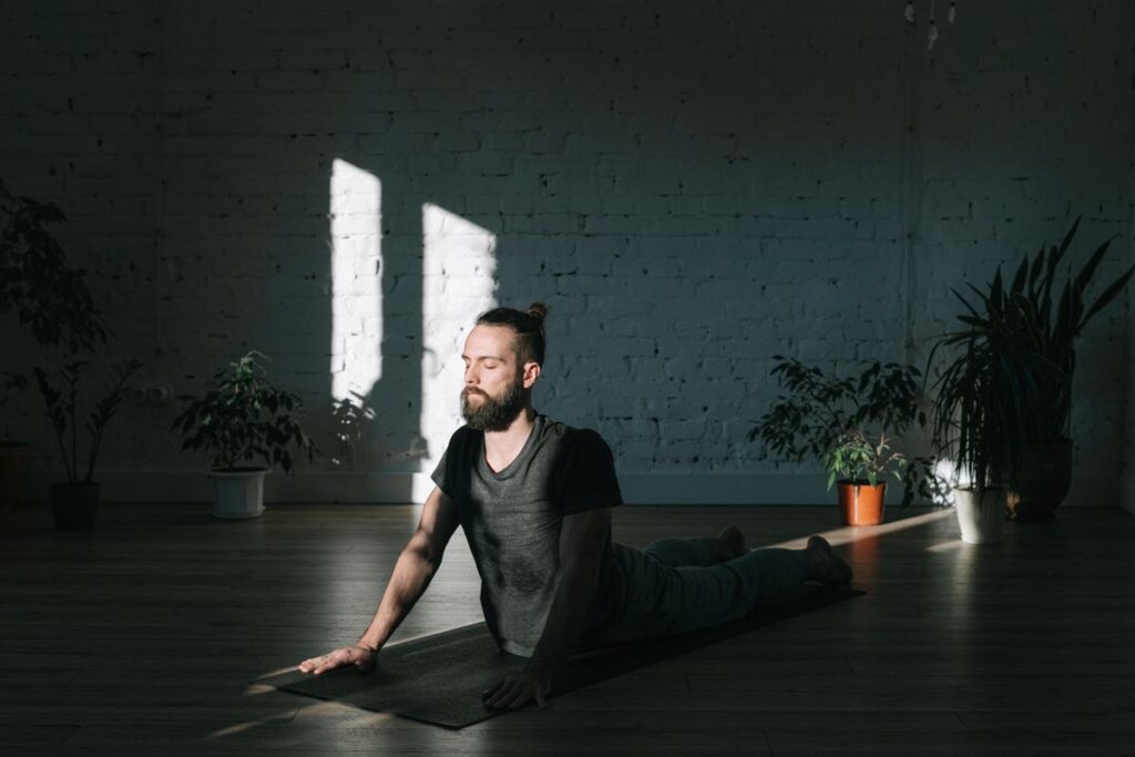 wellness gadgets person meditating at home in sunlight