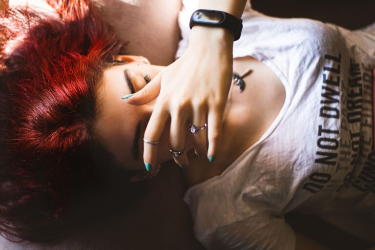 wellness gadgets person sleeping peacefully with smartwatch